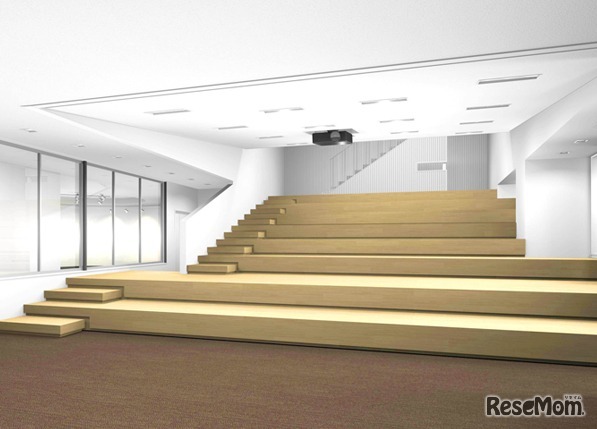 【2F サクセス･ホール】　講演会や特別授業など様々なイベントを開催する多目的ホール。階段状のオープンな作りで、200インチの巨大スクリーンも備えている