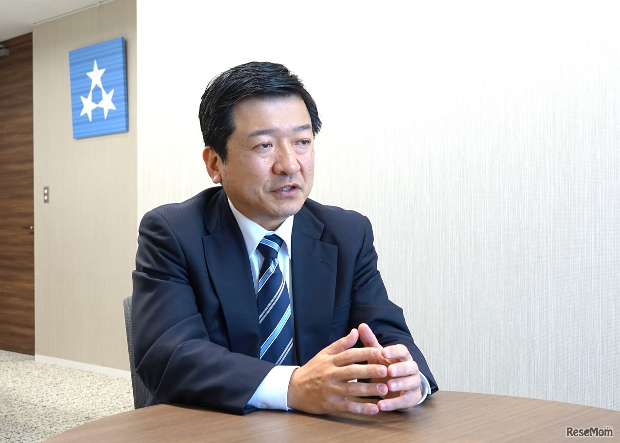 インタビューに応える堤威晴氏