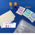 内容物（二酸化炭素検出薬、発泡剤のもと、試験管、小さじ、ろ紙、ビニール袋）
