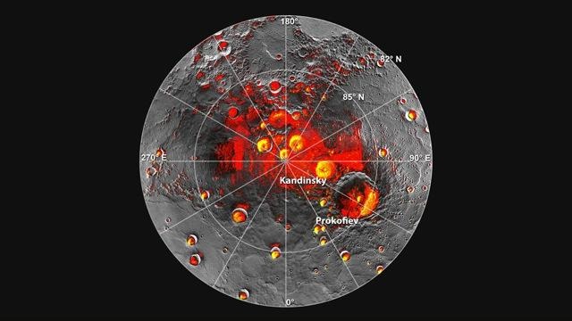 メッセンジャーが観測した、水星の北極地方の地形図。赤い部分が日陰。　NASA/Johns Hopkins University Applied Physics Laboratory/Carnegie Institution of Washington/National Astronomy and Ionosphere Center, Arecibo Observatory. 